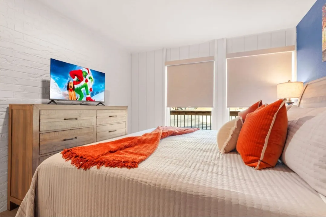 King bedroom with large dresser